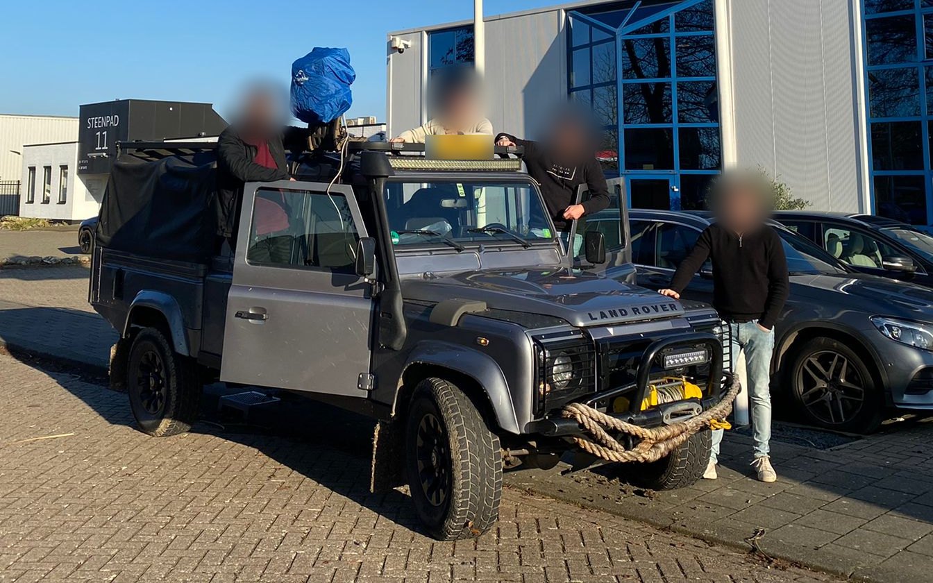 The team with a vehicle we built up, in front of our building in Willemstad